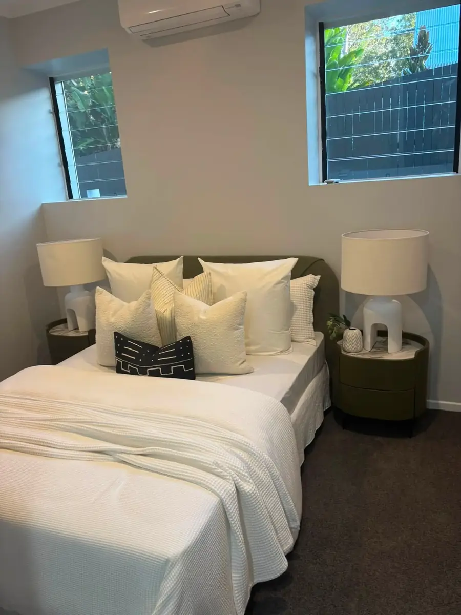 Neatly made bedroom in a clean, well-presented home